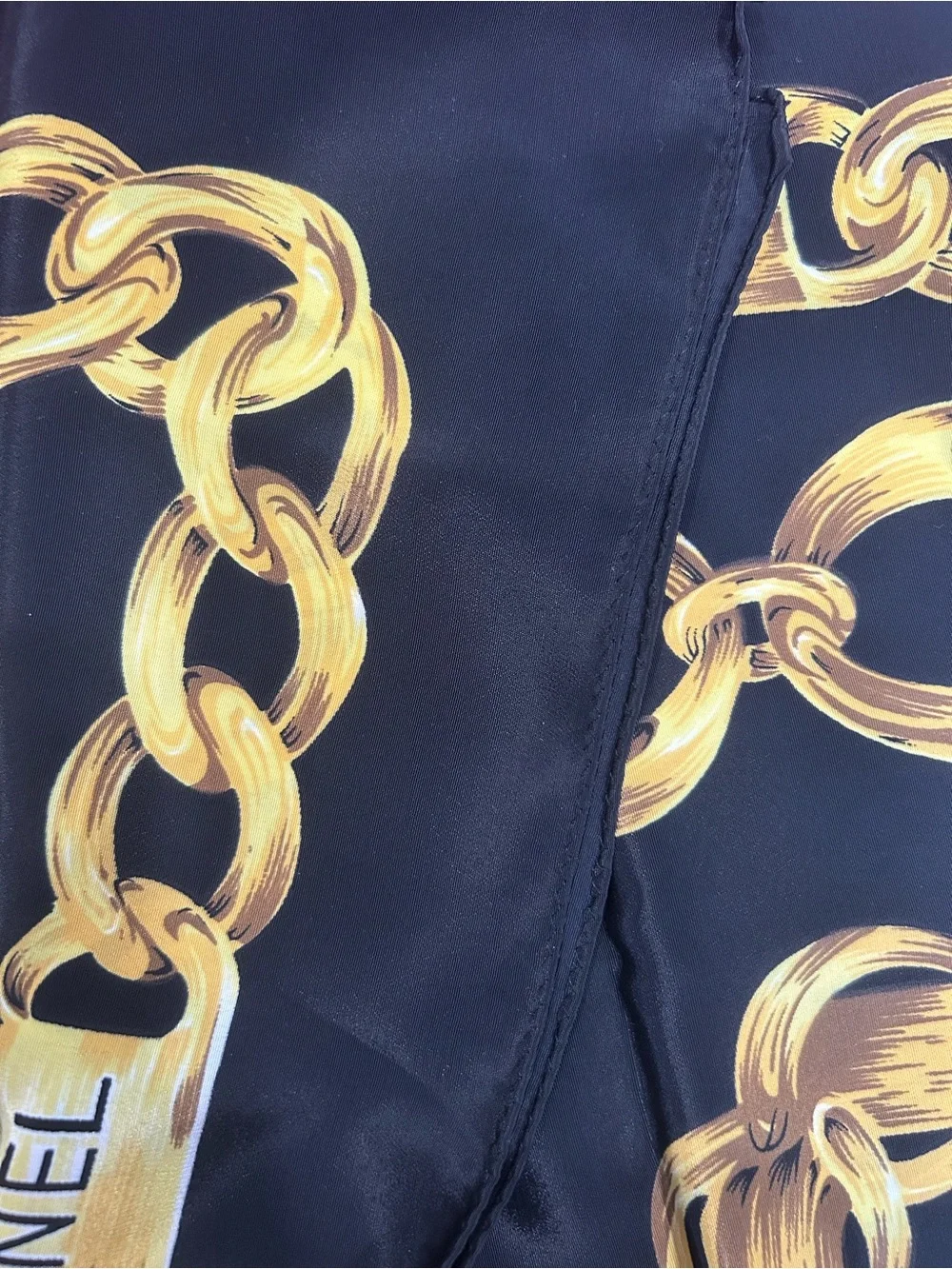 CHANEL Black and Gold Silk Scarf with Chain Motif
